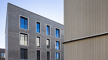 Außenansicht des Wohngebäudes Safranberg in Ulm Außenansicht des Wohngebäudes Safranberg mit verschiedenen Fassaden